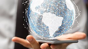 Digital globe above a smartphone